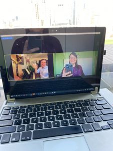 A computer showing Paul and student Julie Muccillo get ready for their Zoom voice lesson.